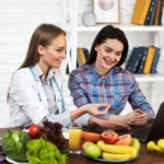 Insulin Resistance Nutritionist Explaining Diabetic Patient about fruits and vegetables